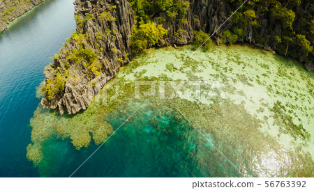Coron, Palawan, Philippines, aerial view of beautiful Twin lagoon and limestone cliffs. Fisheye view Coron, Palawan, Philippines, aerial view of beautiful Twin lagoon and limestone cliffs. Fisheye view 56763392