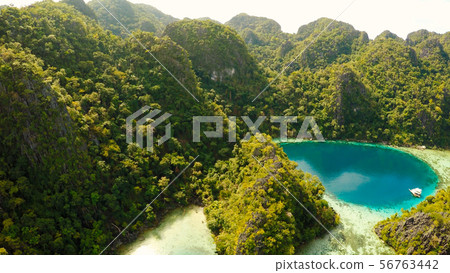 Coron, Palawan, Philippines, aerial view of beautiful Twin lagoon and limestone cliffs. Fisheye view Coron, Palawan, Philippines, aerial view of beautiful Twin lagoon and limestone cliffs. Fisheye view 56763442