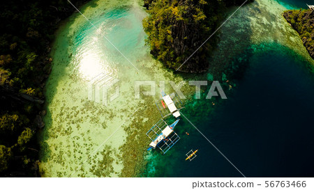 Coron, Palawan, Philippines, aerial view of beautiful Twin lagoon and limestone cliffs. Fisheye view Coron, Palawan, Philippines, aerial view of beautiful Twin lagoon and limestone cliffs. Fisheye view 56763466