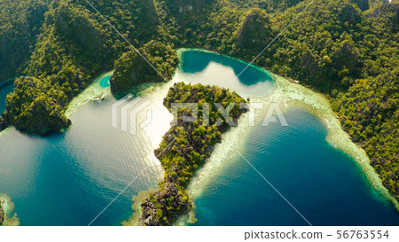 Coron, Palawan, Philippines, aerial view of beautiful Twin lagoon and limestone cliffs. Fisheye view Coron, Palawan, Philippines, aerial view of beautiful Twin lagoon and limestone cliffs. Fisheye view 56763554