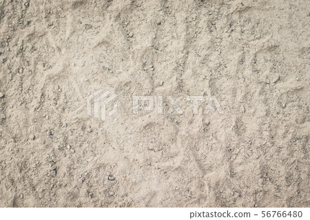 Texture traces of tractor tires on the ground 56766480