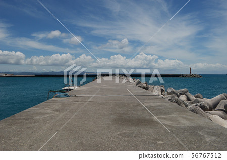 Emerald green sea and embankment Emerald green sea and embankment 56767512
