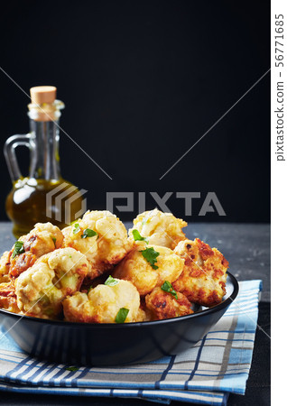 Moroccan tempura style Fried Cauliflower, top view Moroccan tempura style Fried Cauliflower, top view 56771685
