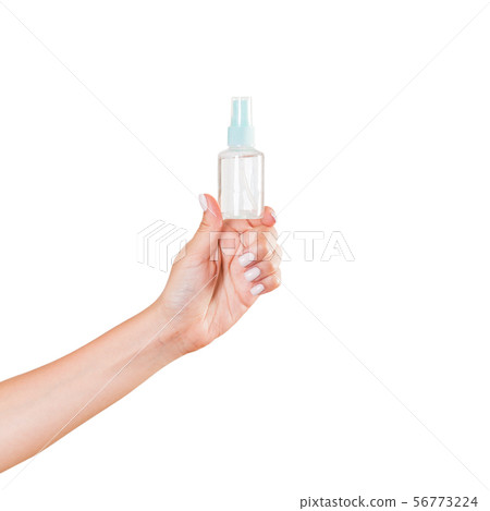 Female hand holding cream bottle of lotion Female hand holding cream bottle of lotion 56773224