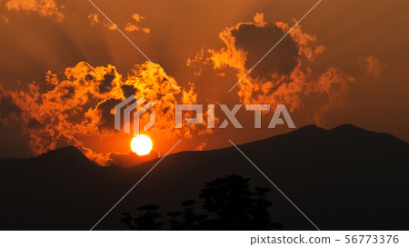 Sunset on the peak of Mountain with cloud Sunset on the peak of Mountain with cloud 56773376