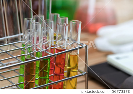Stand with test tubes isolated on white. Stand with test tubes isolated on white. 56773378