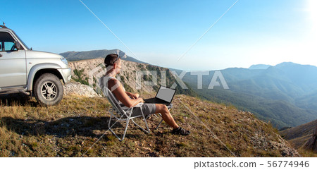tourist - freelancer on wild nature 56774946
