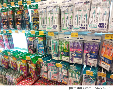 Toothbrush is displayed for sale  56776228