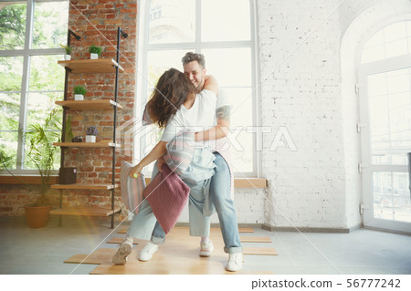 Young couple moved to a new house or apartment 56777242