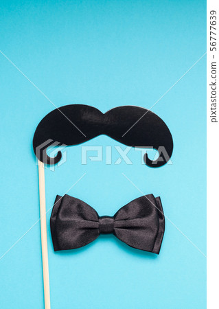 Paper moustaches for men fathers dad concept Paper moustaches for men fathers dad concept 56777639