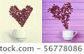 Grain of coffee in the form of a heart over a cup. 56778086