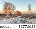 Winter suburban landscape with power line 56778088