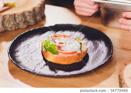 Chef making healthy vegetarian salmon burgers outdoor on open kitchen, odprta kuhna, international Chef making healthy vegetarian salmon burgers outdoor on open kitchen, odprta kuhna, international 56778466