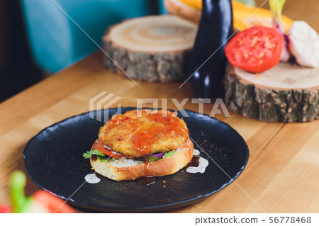 Chef making healthy vegetarian salmon burgers outdoor on open kitchen, odprta kuhna, international Chef making healthy vegetarian salmon burgers outdoor on open kitchen, odprta kuhna, international 56778468