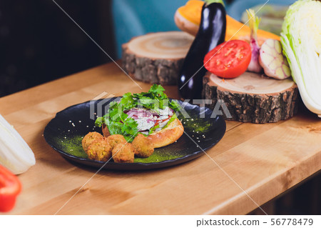 Chef making healthy vegetarian salmon burgers outdoor on open kitchen, odprta kuhna, international 56778479