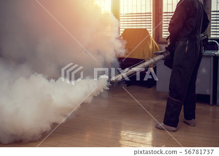 Man work fogging to eliminate mosquito Man work fogging to eliminate mosquito 56781737