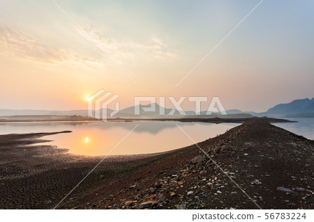 Cracked dry land without water.Abstract background Cracked dry land without water.Abstract background 56783224