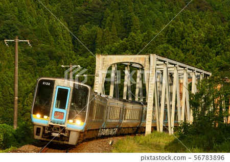Limited express Shimanto + limited express south wind across the Annai river bridge Limited express Shimanto + limited express south wind across the Annai river bridge 56783896