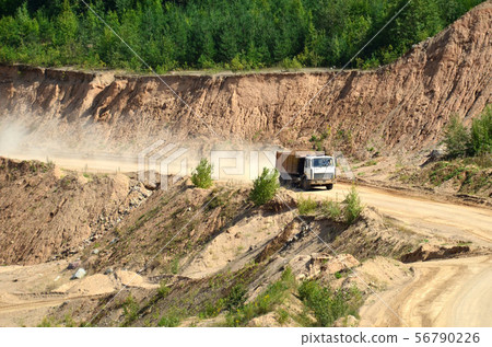 Dump truck transporting sand in mining quarry Dump truck transporting sand in mining quarry 56790226