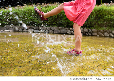Children playing with water Children playing with water 56793646