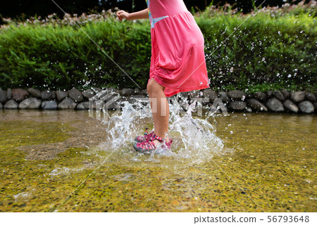 Children playing with water 56793648