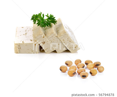 soy beans and tofu cheese on white background. soy beans and tofu cheese on white background. 56794878