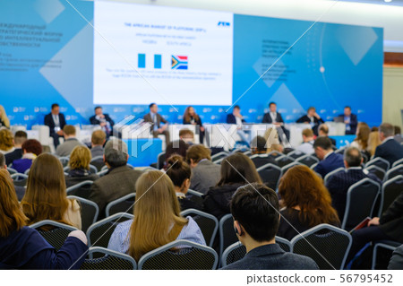 Business conference participants listen to lecturer 56795452