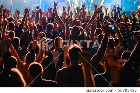 Fans at live rock music concert cheering Fans at live rock music concert cheering 56795458