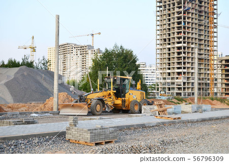 Motor Grader at a construction site level ground Motor Grader at a construction site level ground 56796309