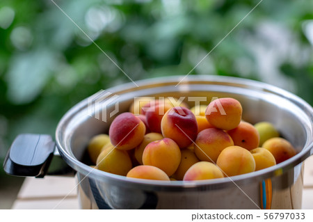 Plum juice making 56797033