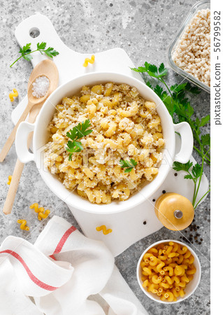 Makaroni po-flotski. Boiled pasta in navy-style Makaroni po-flotski. Boiled pasta in navy-style 56799582