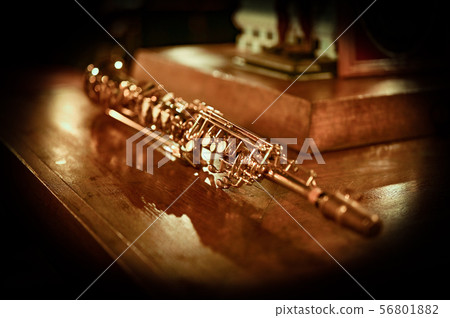 Soprano saxophone centered in black frame Soprano saxophone centered in black frame 56801882