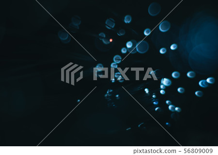 Beautiful optical blue cold bokeh on a dark 56809009