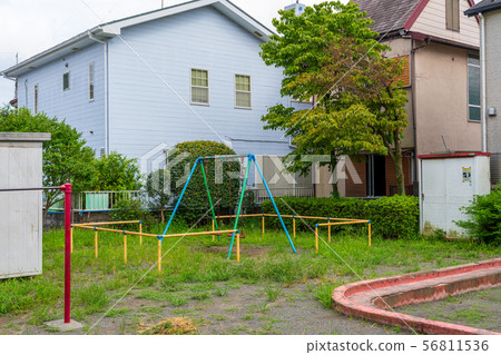 A small children's park in a residential area 56811536
