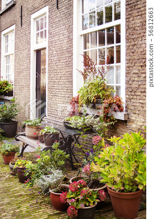 Buildings and garden of the Beguinage in Breda, 56812663