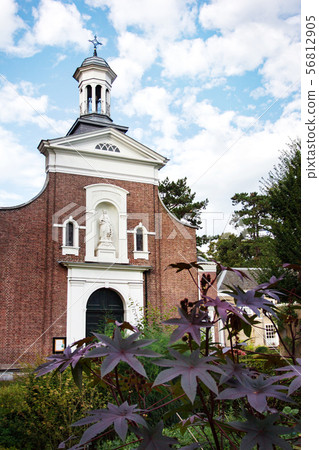 Catholic church in garden of the Beguinage in Catholic church in garden of the Beguinage in 56812905
