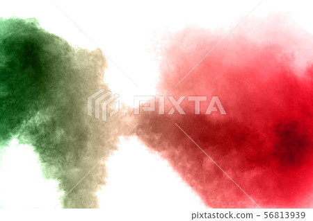 Red green powder explosion on white background. Red green powder explosion on white background. 56813939