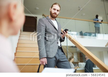 Succesfsul Businessman Going Downstairs Succesfsul Businessman Going Downstairs 56814541