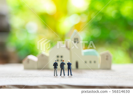 Miniature 3 people businessmen standing with back 56814630