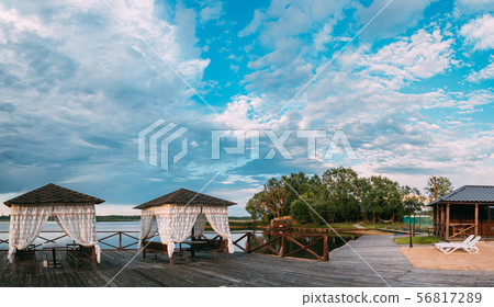 Braslaw, Vitebsk Voblast, Belarus. Seagull Gull Bird Sitting Near Wooden Arbor In A Wooden Pier For 56817289