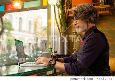 Concentrated man working on his new project. Concentrated man working on his new project. 56817855