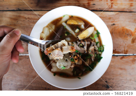 eating noodle, Chinese noodle or pork noodle eating noodle, Chinese noodle or pork noodle 56821419