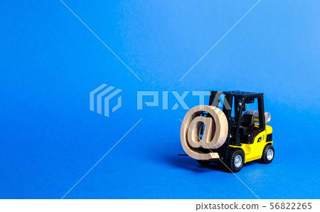 Yellow Forklift truck carry email symbol 56822265