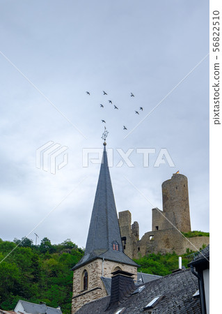Pfarrkirche church and Lowenburg castle, Monreal 56822510