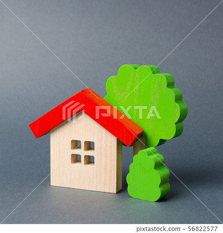 Wooden house and trees. Environmentally friendly Wooden house and trees. Environmentally friendly 56822577