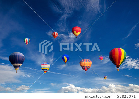Colourful hot air balloons flying over white cloud Colourful hot air balloons flying over white cloud 56823071