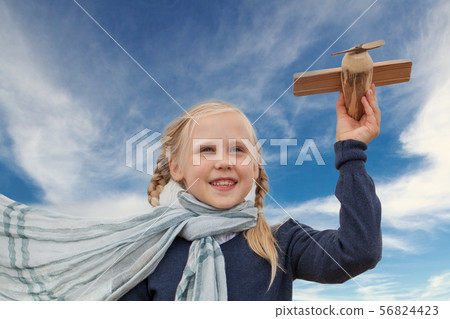 Traveling and freedom concept girl and airplane 56824423