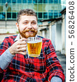 Young Man With A Beer 56826408