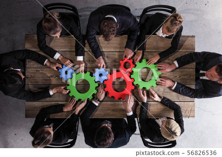 Business people Joining Together Gears 56826536