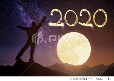 happy new year 2016.man on top of the mountain 56829919